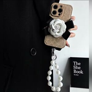 Elegant Floral Leather iPhone Case with Pearl Handle